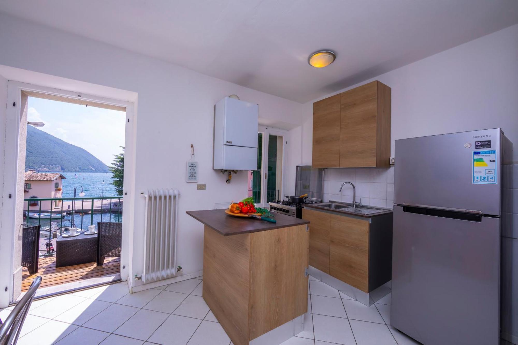 Dogana Best Lake View - Happy Rentals Торболе Экстерьер фото